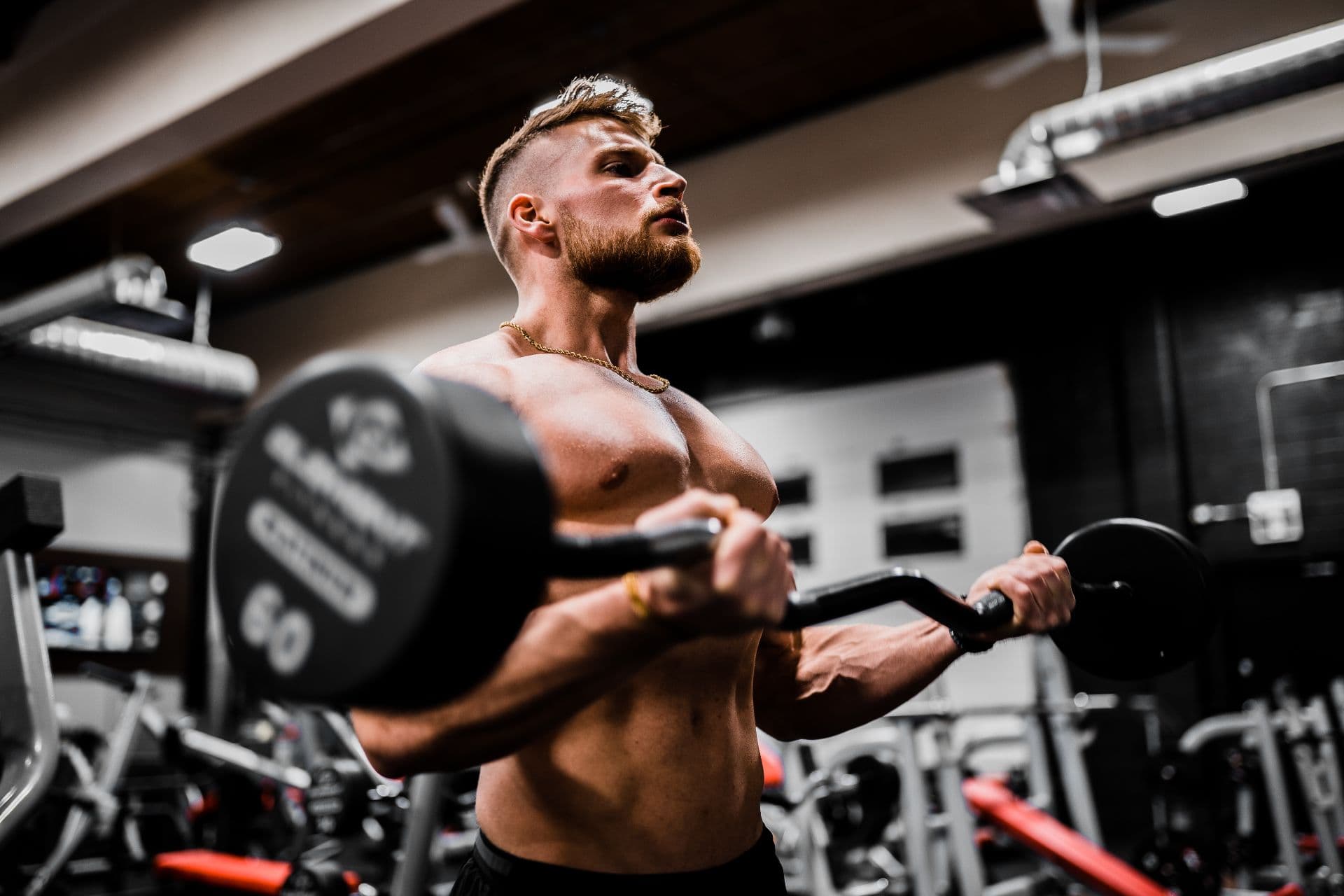 Man curling 60 pounds